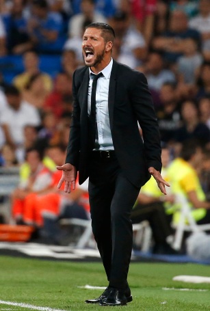 Atletico Madrid's coach Diego Simeone reacts during their Spanish Super Cup first leg soccer match against Real  Madrid at the Santiago Bernabeu stadium in Madrid